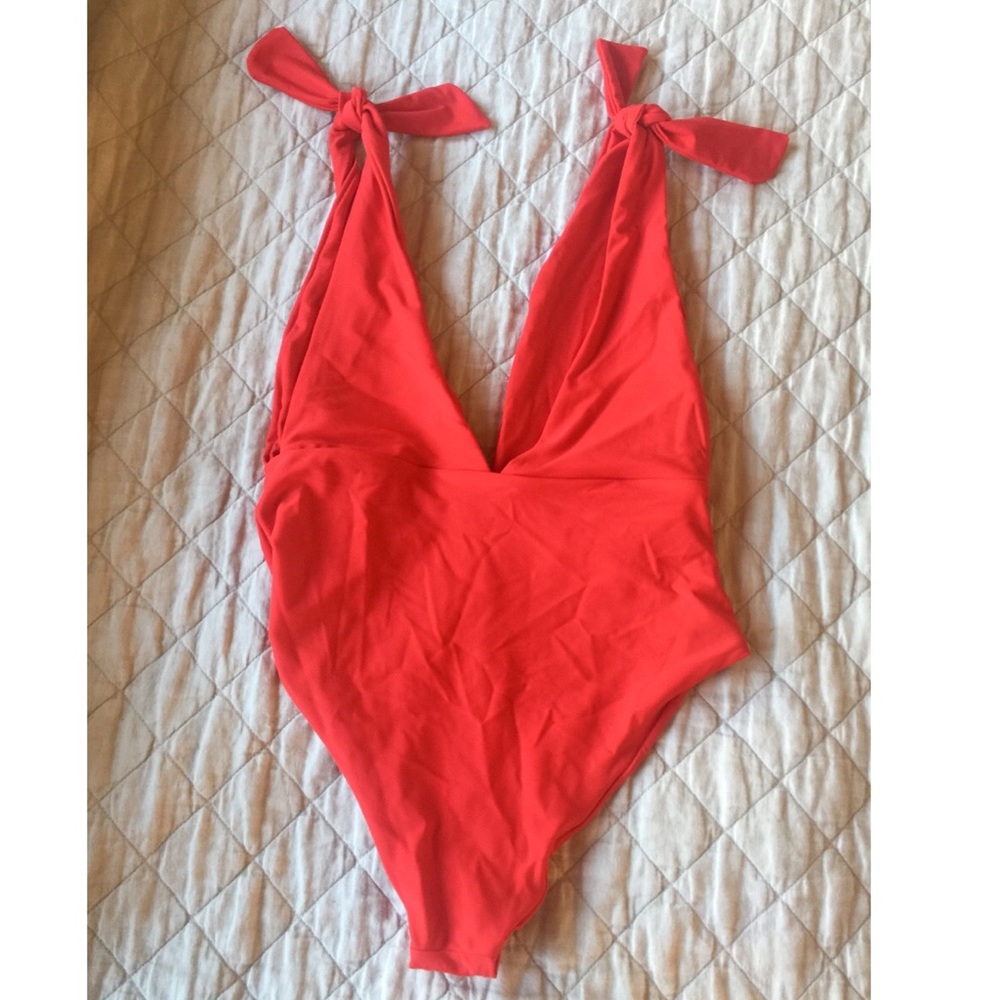 new red one piece with bows on shoulders